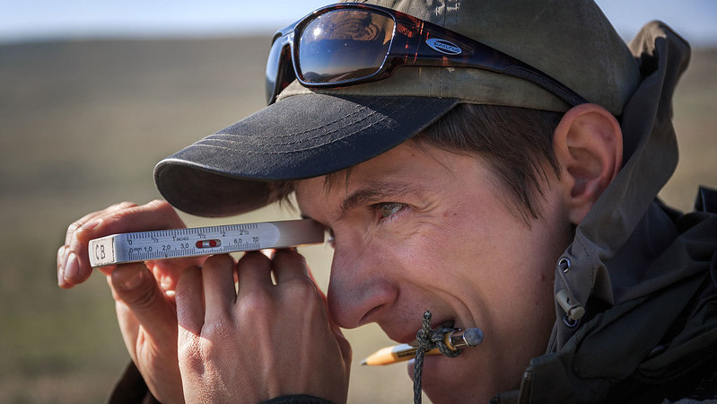 A person using a range-finder